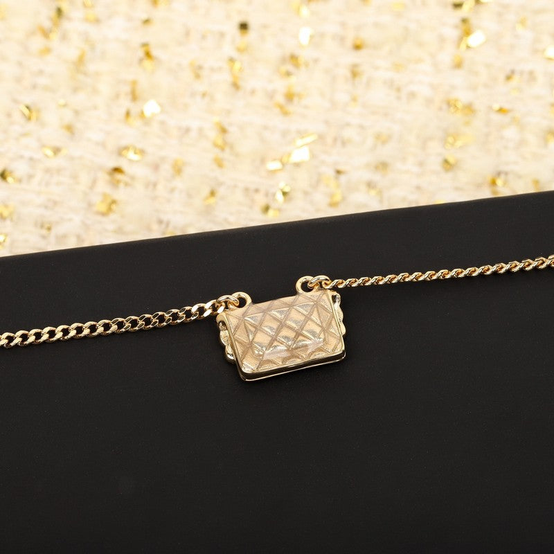 Chanel Bag Pendant 18K Gold Necklace