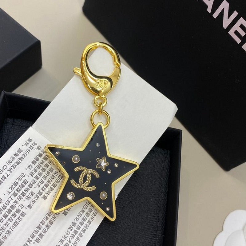 Chanel Black Gold Star 18K Gold Brooch