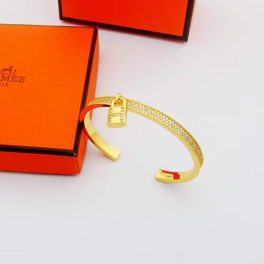 Hermes Kelly Lock Vintage Hermes 18K Gold Bracelet