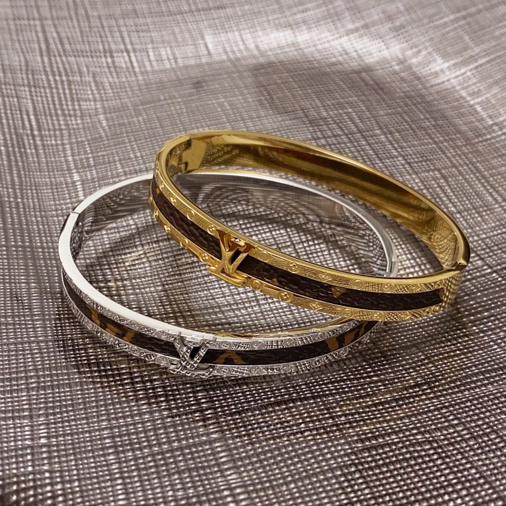 Louis Vuitton Leather Vintage 18K Gold Bracelet