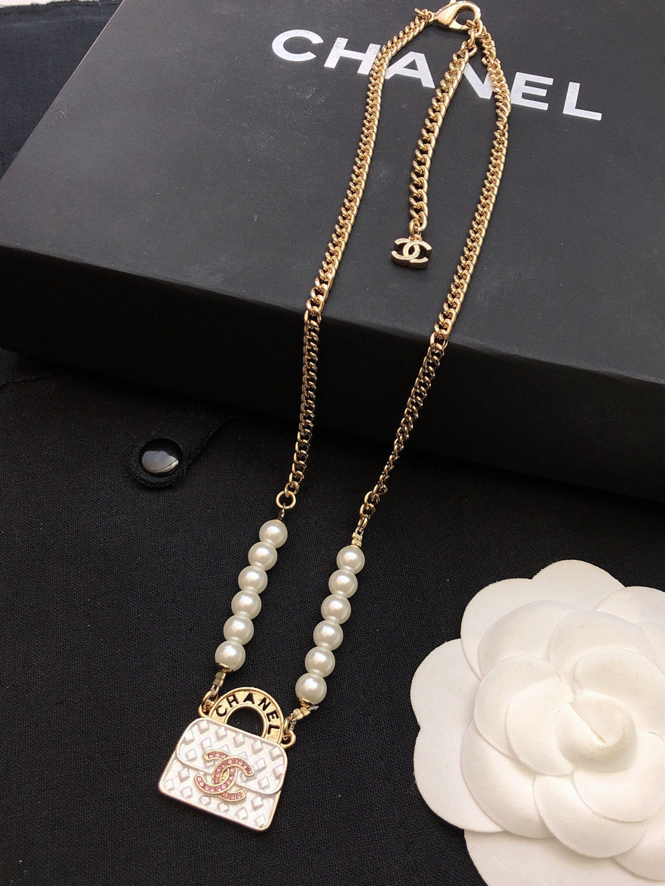 Chanel Pearls Bag Pendant 18K Gold Necklace