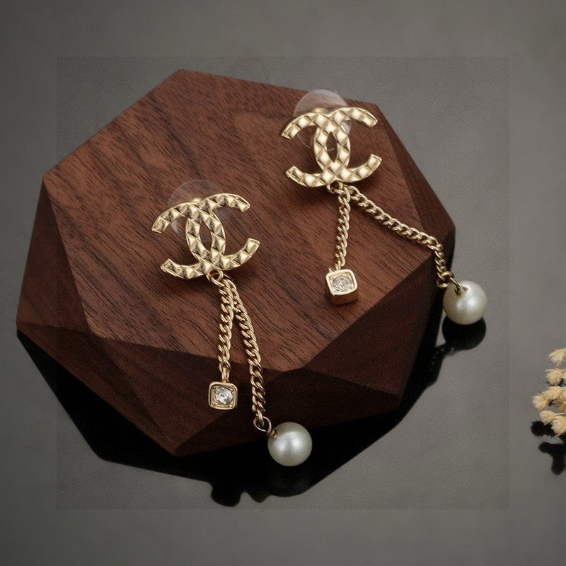 Chanel Long Pearl Pendant 18K Gold Earrings