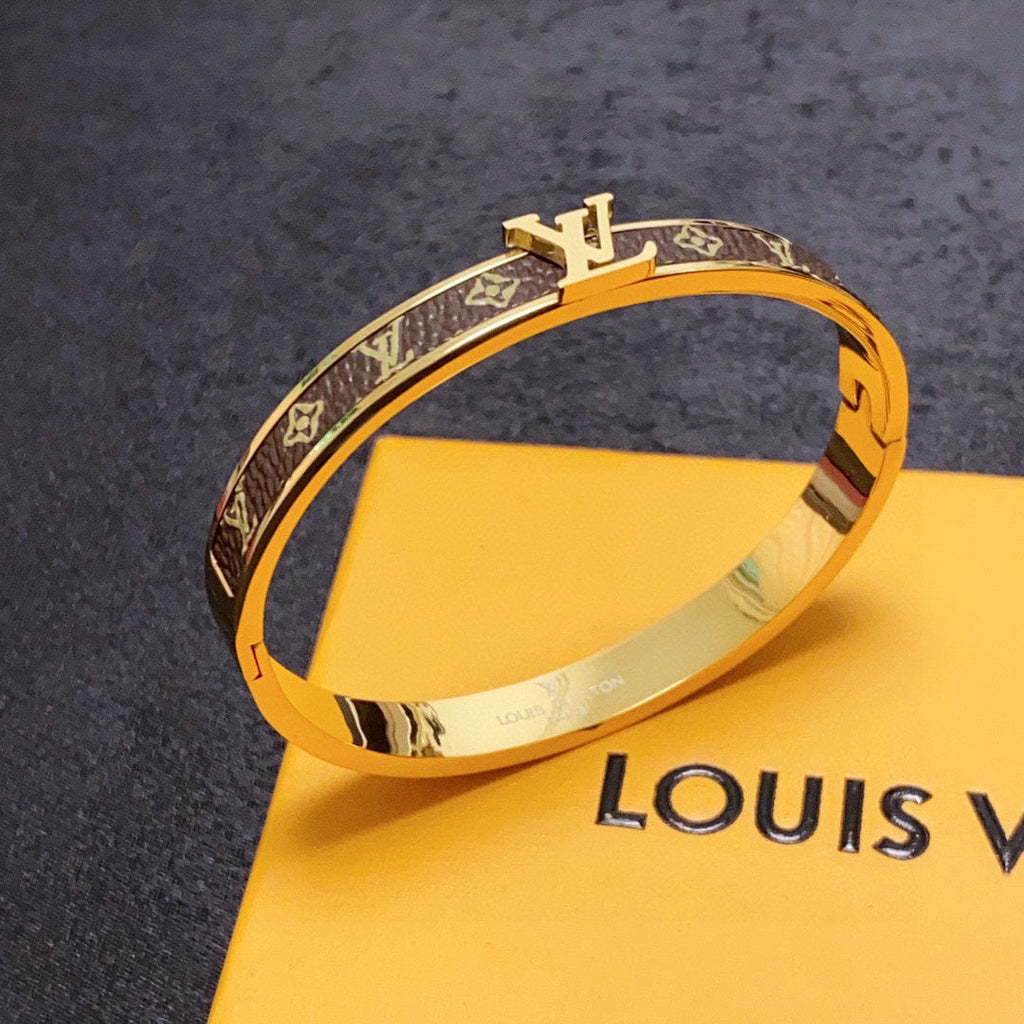 Louis Vuitton Leather Vintage 18K Gold Bracelet