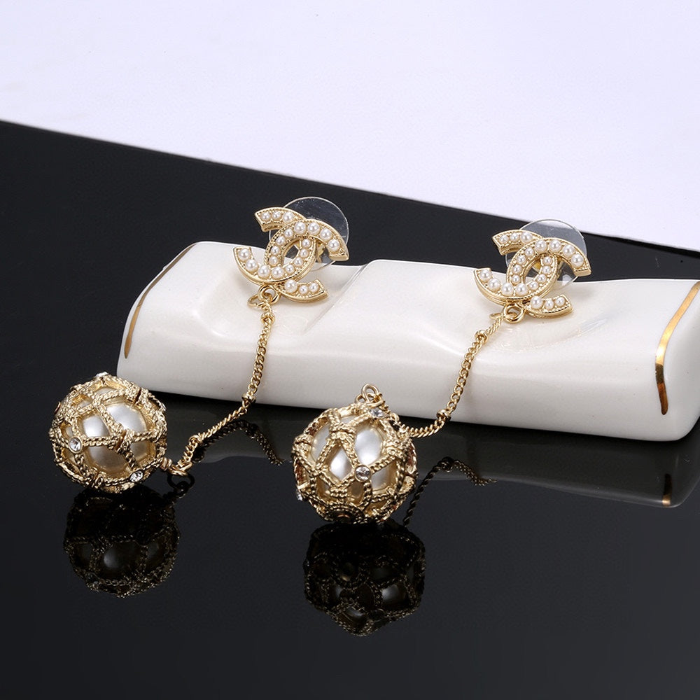 Chanel Pearl Long 18K Gold Earrings