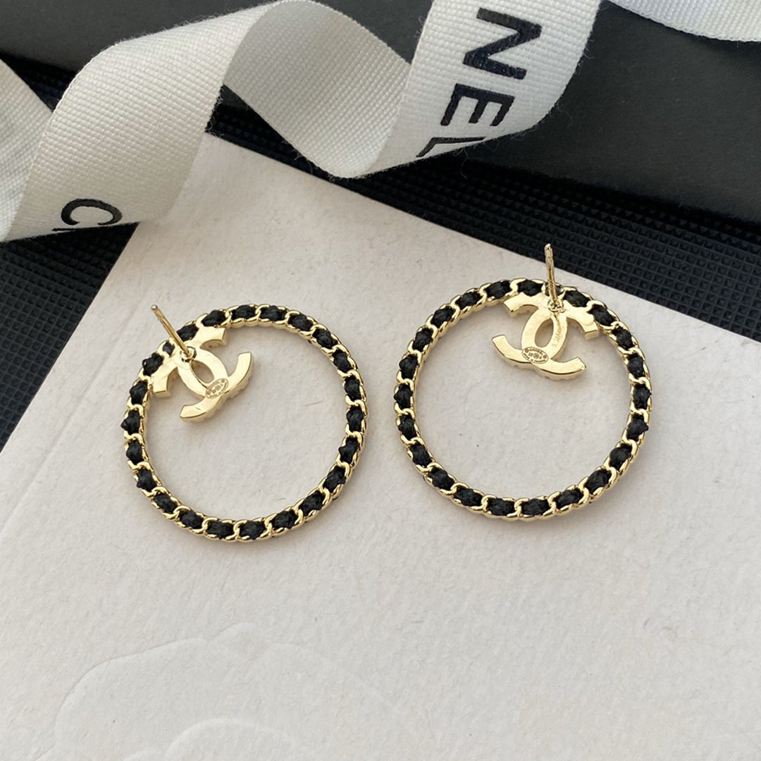 Chanel Black Leather Circle 18K Gold Earrings