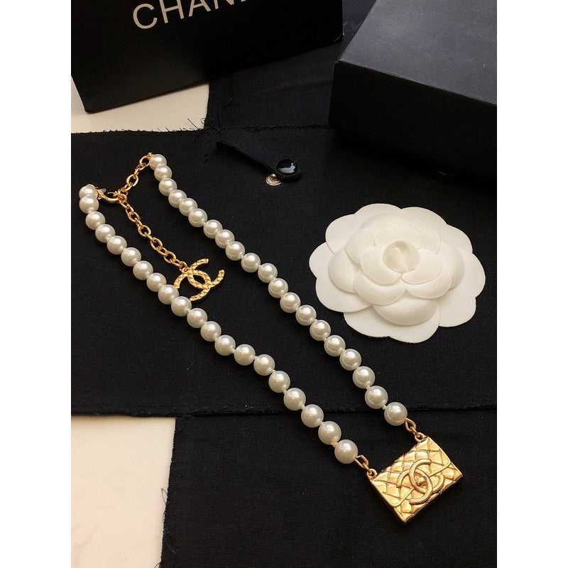 Chanel Pearl Bag Pendant 18K Gold Necklace