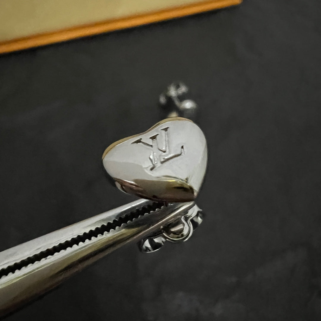 Louis Vuitton Heart 18K Gold Earrings