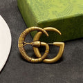 Gucci Double Snake 18K Gold Brooch