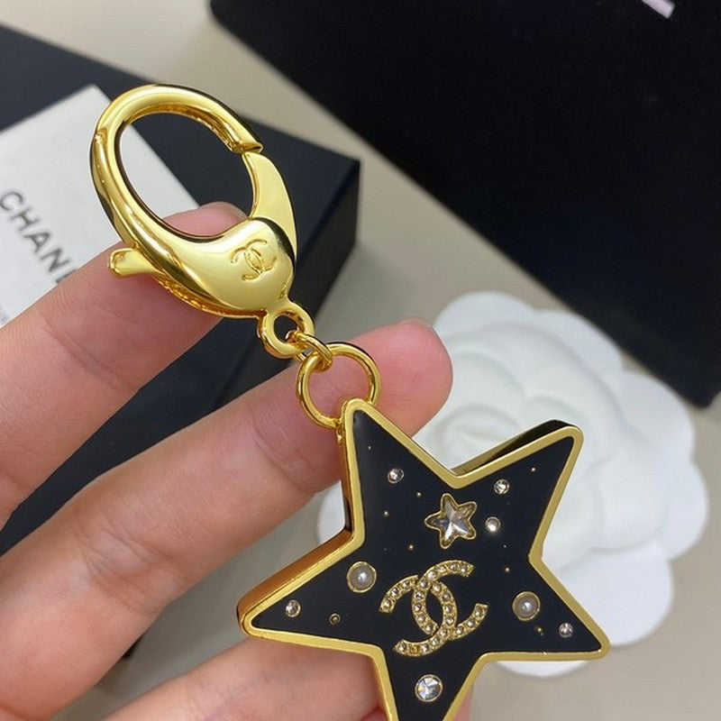 Chanel Black Gold Star 18K Gold Brooch