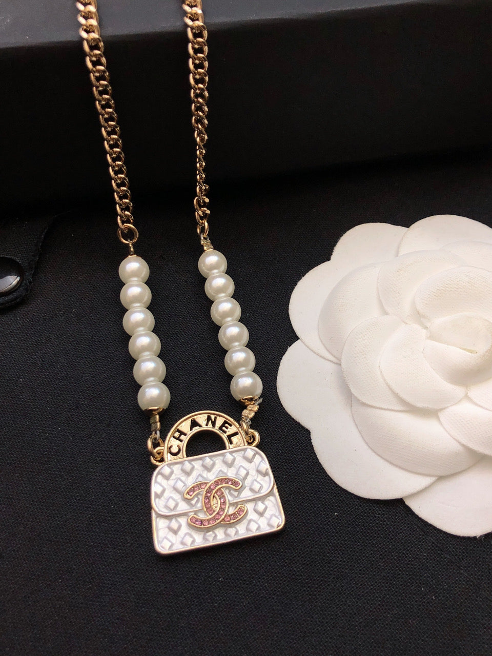 Chanel Pearls Bag Pendant 18K Gold Necklace