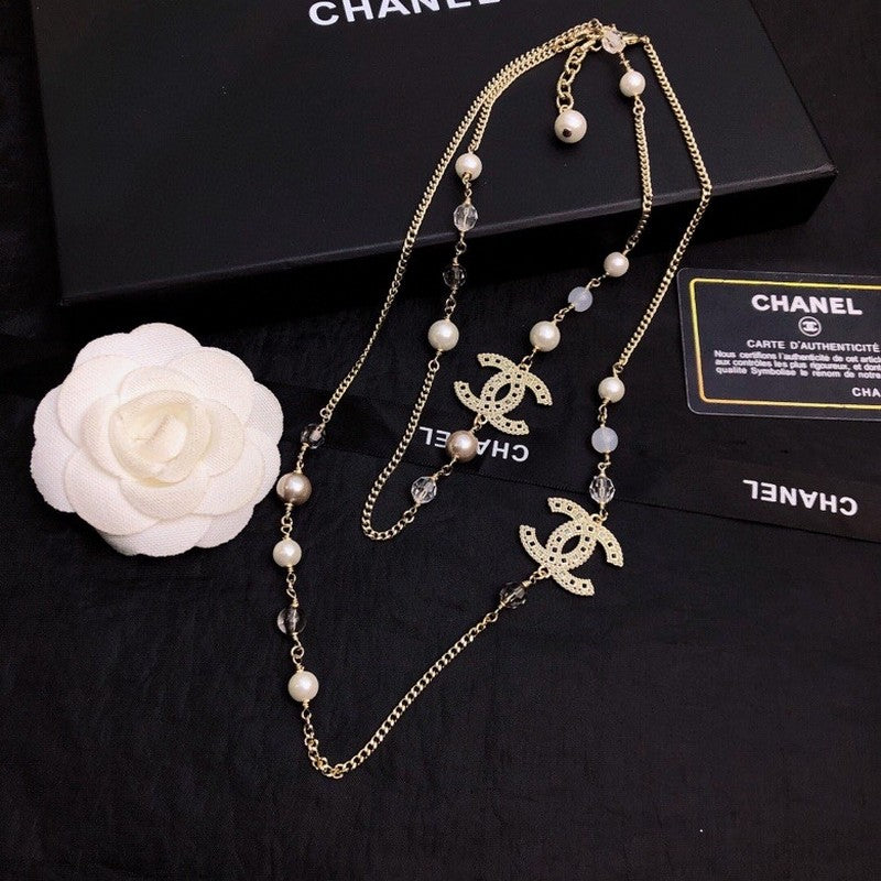 Chanel Long Pearl 18K Gold Necklace