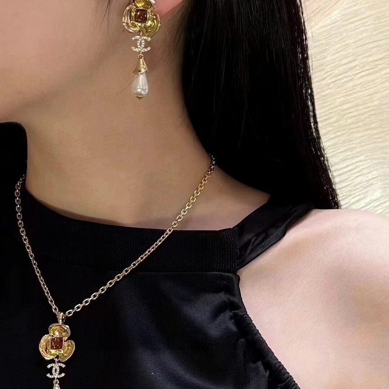 Chanel Camellia Pearl 18K Gold Earrings