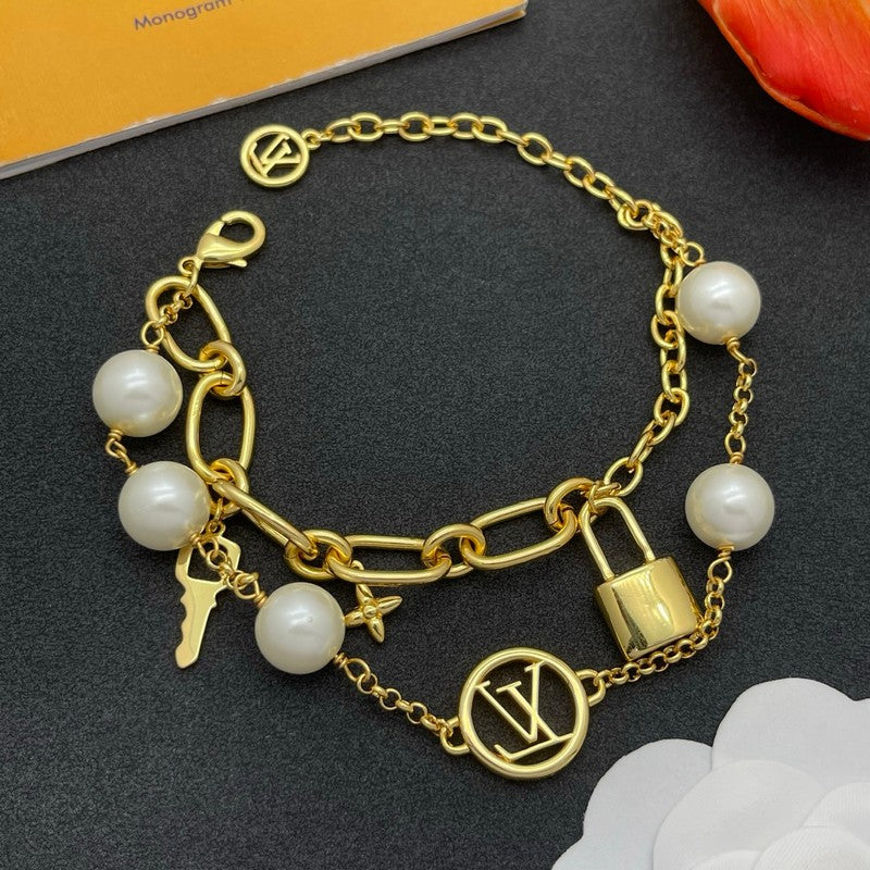 Louis Vuitton Pearl Lock Gold 18K Gold Bracelet