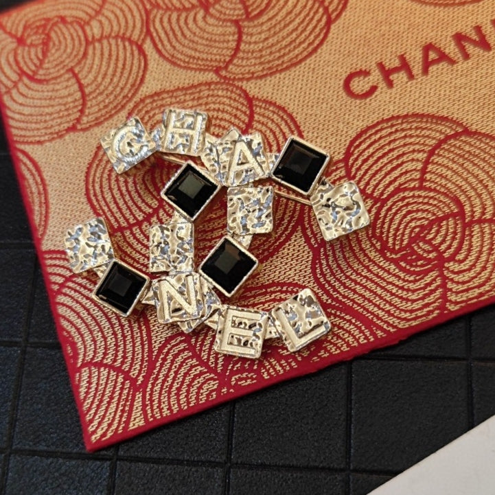 Chanel Black Crystals 18K Gold Brooch