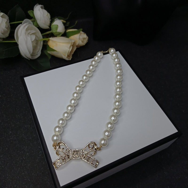 Chanel Bow Pearl 18K Gold Necklace