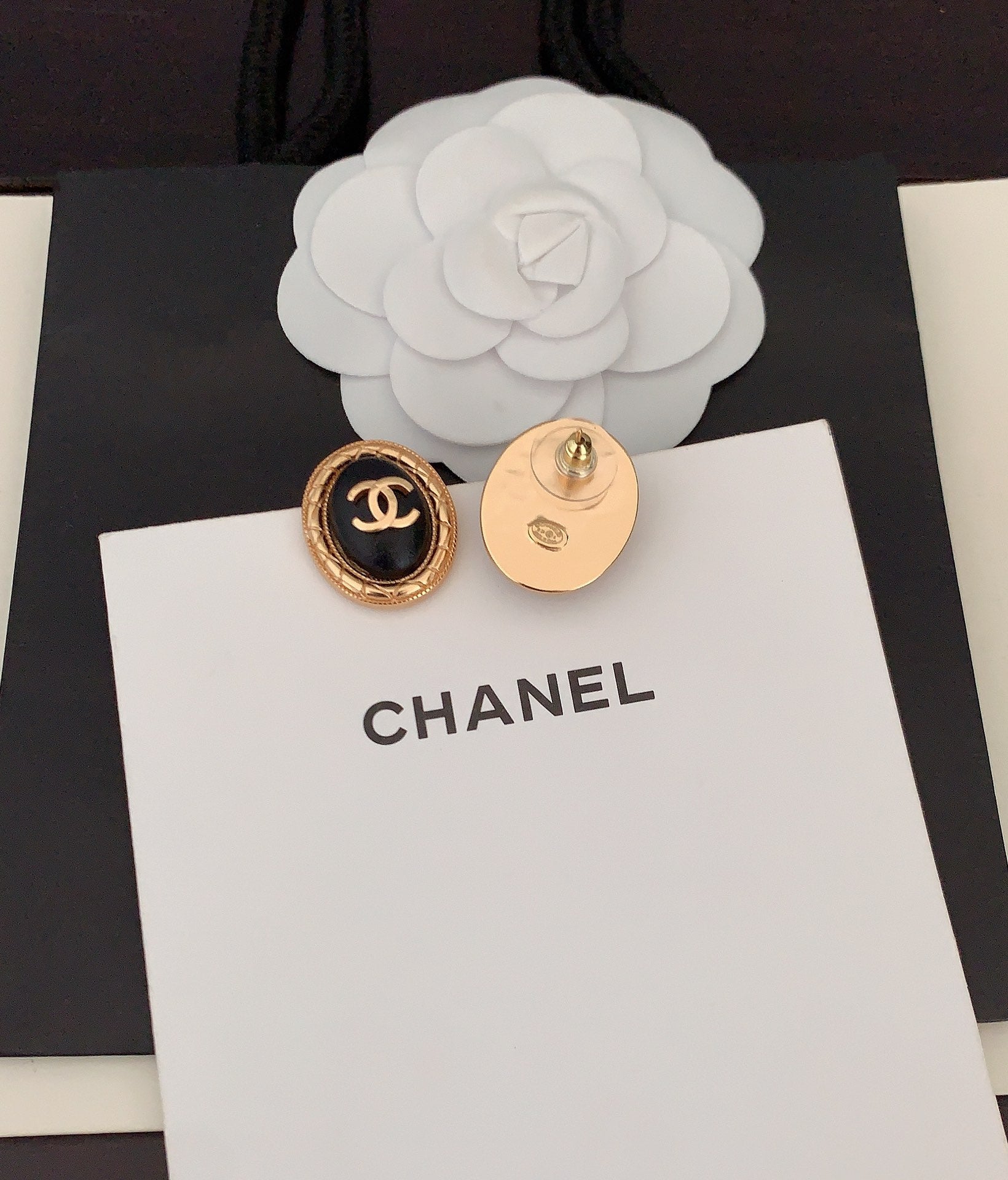 Chanel Oval Leather 18K Gold Earrings