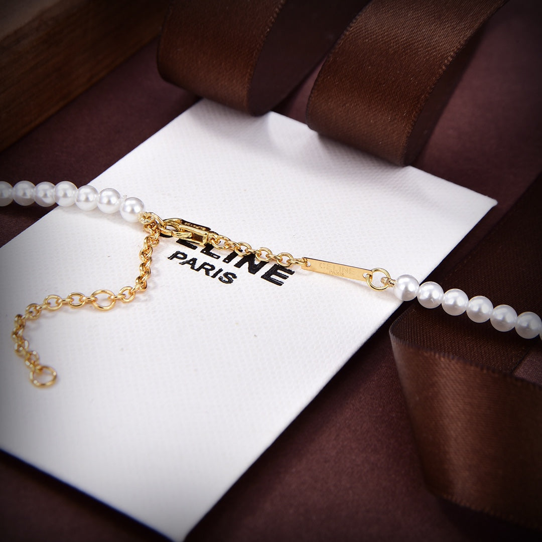 Celine Paris Pearls 18K Gold Bracelet
