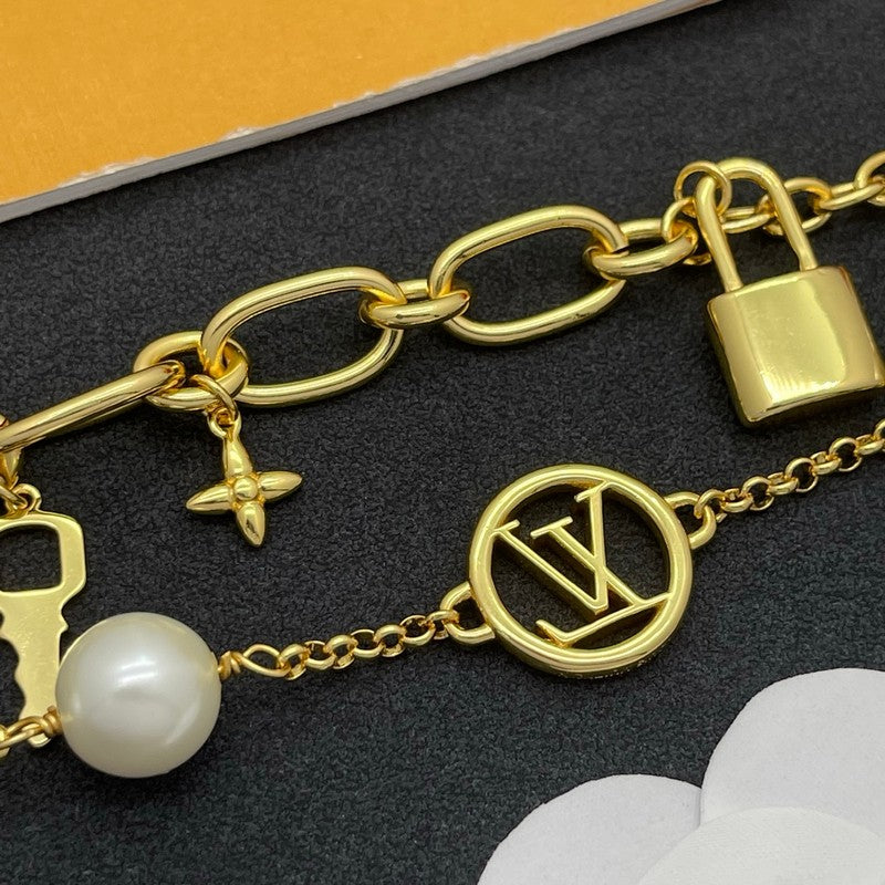 Louis Vuitton Pearl Lock Gold 18K Gold Bracelet