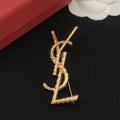 YSL Gold 18K Gold Brooch