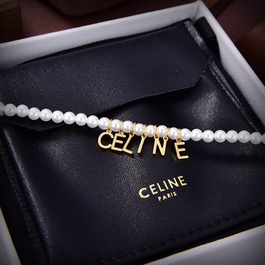 Celine Paris Pearls 18K Gold Bracelet