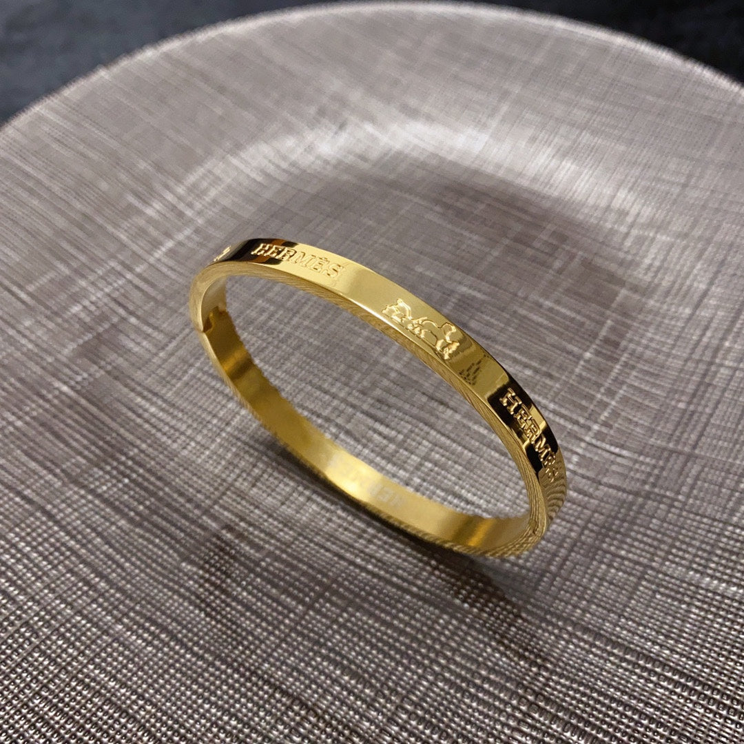 Hermes 18K Gold Bracelet