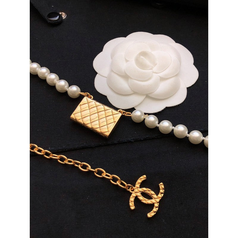Chanel Pearl Bag Pendant 18K Gold Necklace