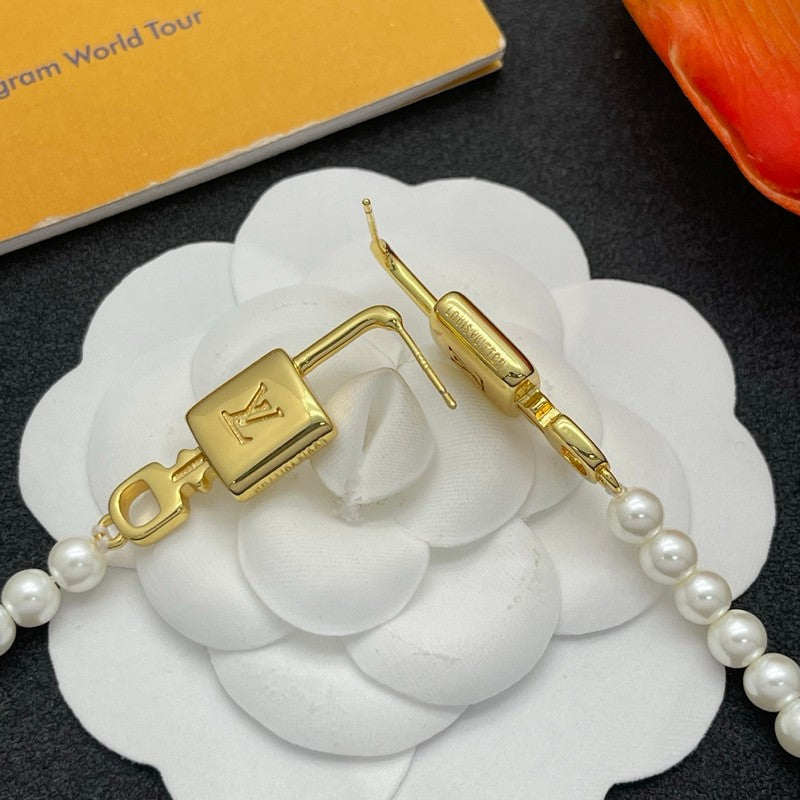 Louis Vuitton Pearl Lock Gold 18K Gold Earrings