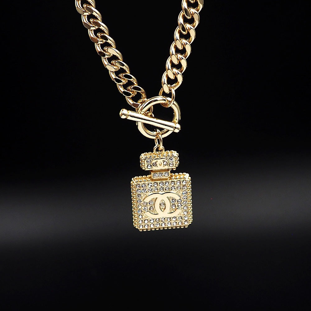 Chanel Diamond Perfume Bottle Pendant 18K Gold Necklace