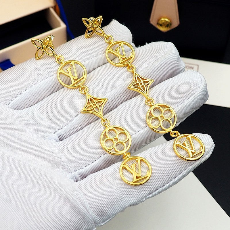 Louis Vuitton Lace Long 18K Gold Earrings