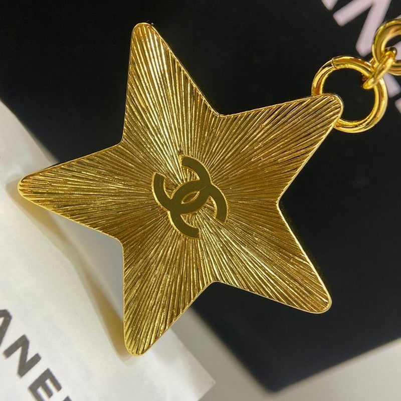 Chanel Black Gold Star 18K Gold Brooch