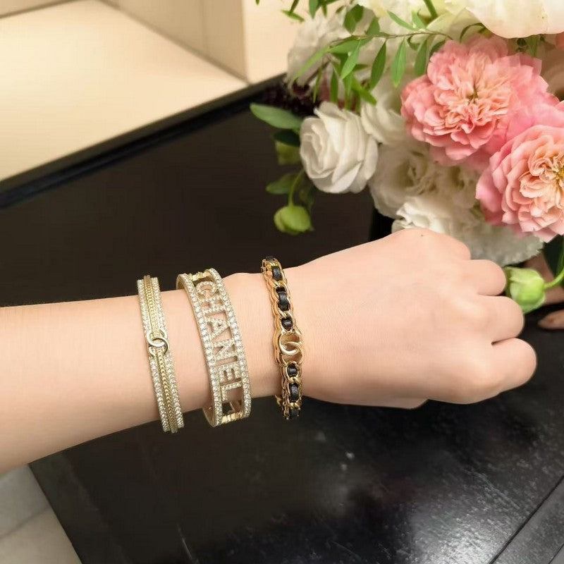 Chanel Black Leather Cuff 18K Gold Bracelet