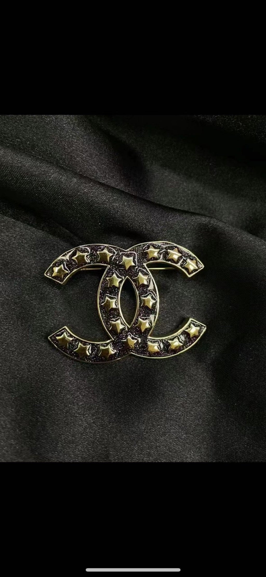 Chanel Black Star 18K Gold Brooch