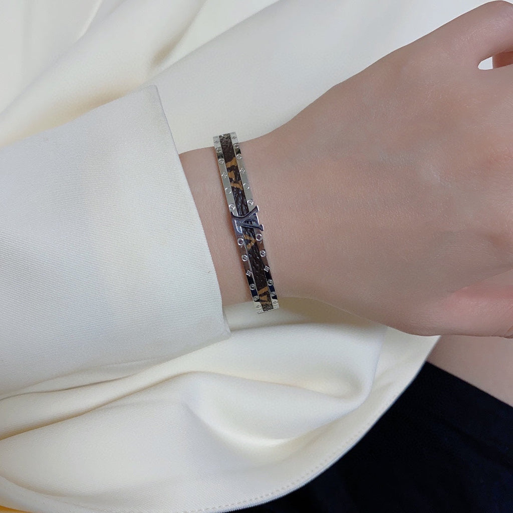 Louis Vuitton Leather Vintage 18K Gold Bracelet
