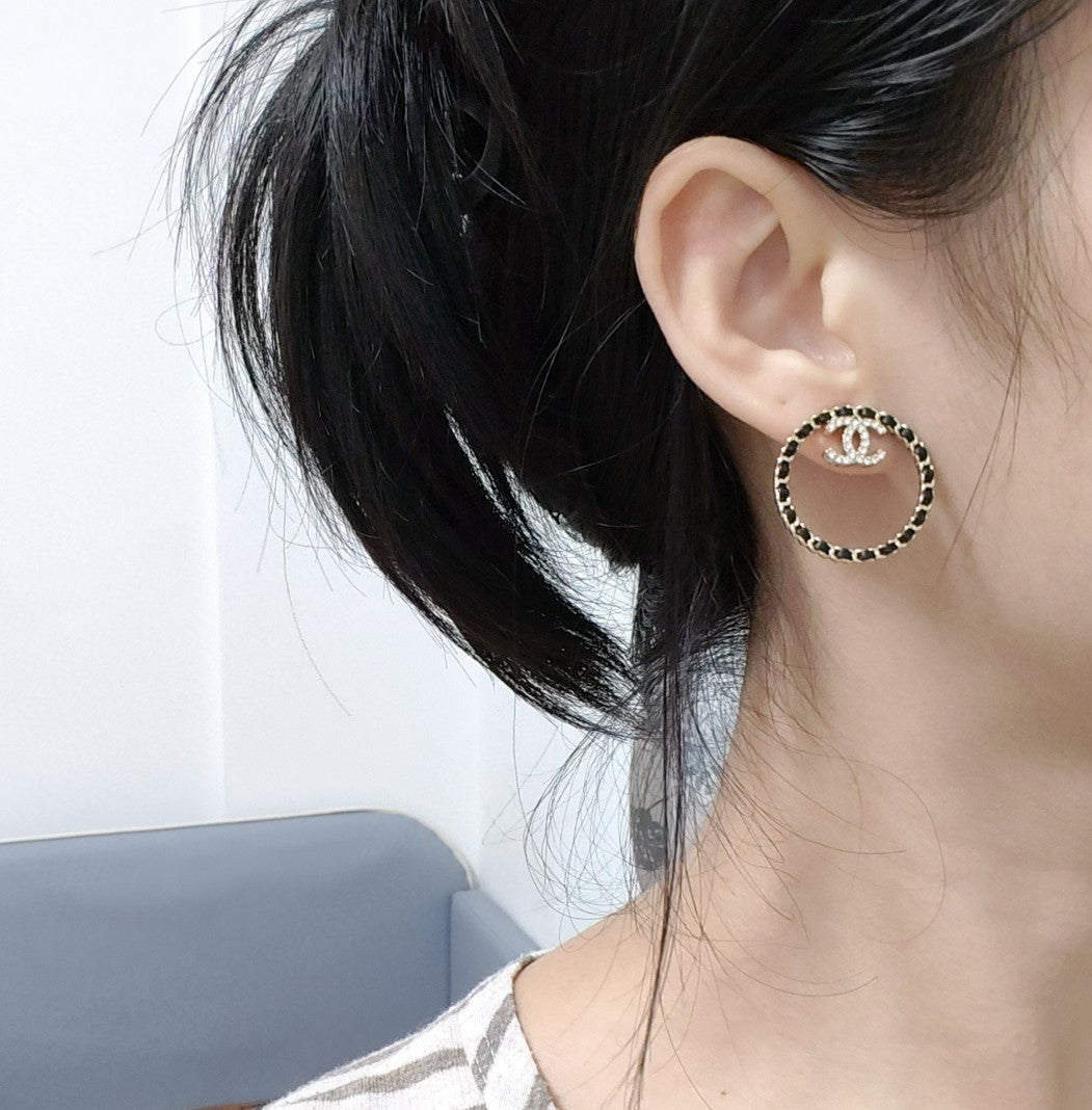 Chanel Black Leather Circle 18K Gold Earrings