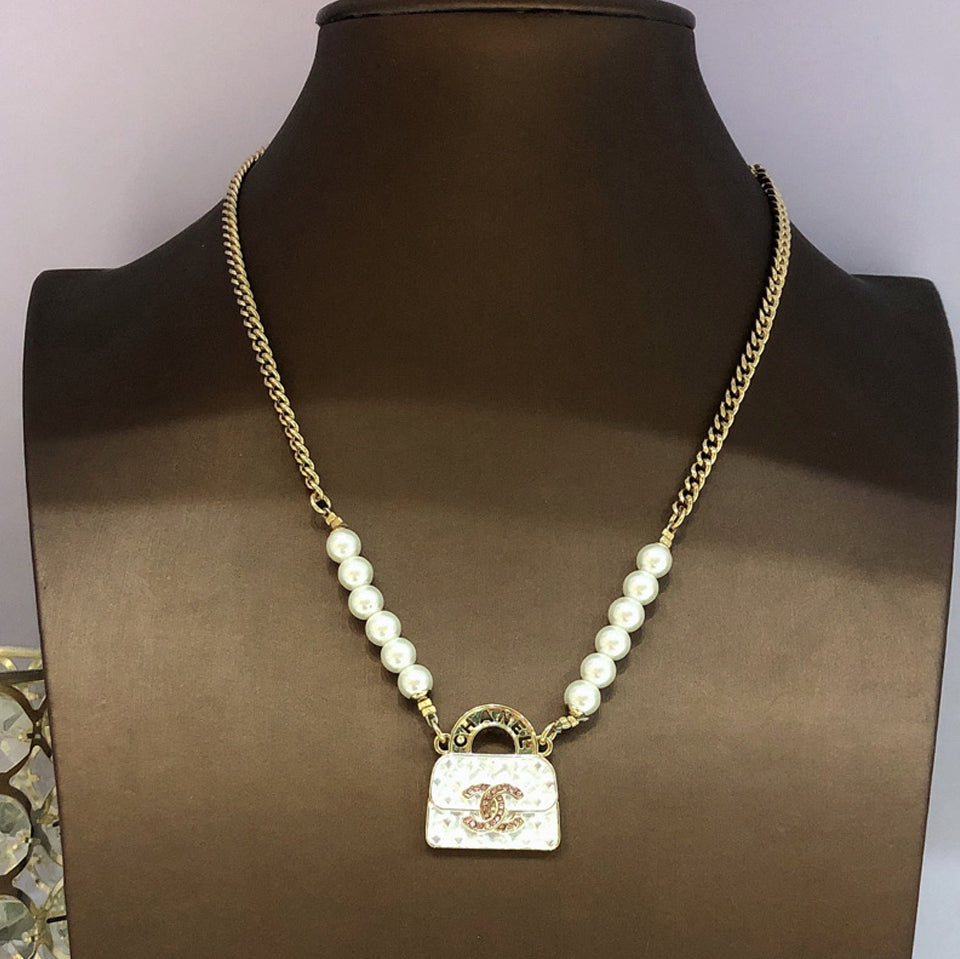 Chanel Pearls Bag Pendant 18K Gold Necklace
