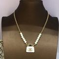 Chanel Pearls Bag Pendant 18K Gold Necklace