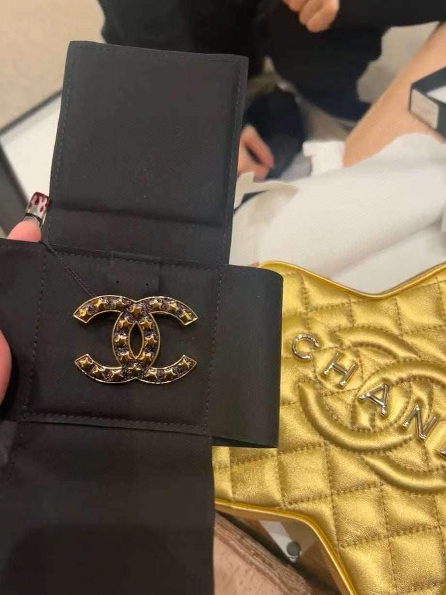 Chanel Black Star 18K Gold Brooch