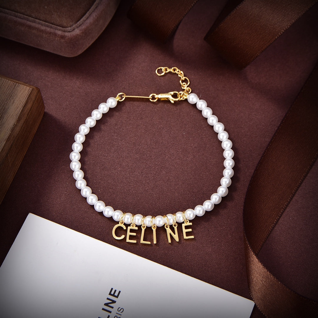 Celine Paris Pearls 18K Gold Bracelet