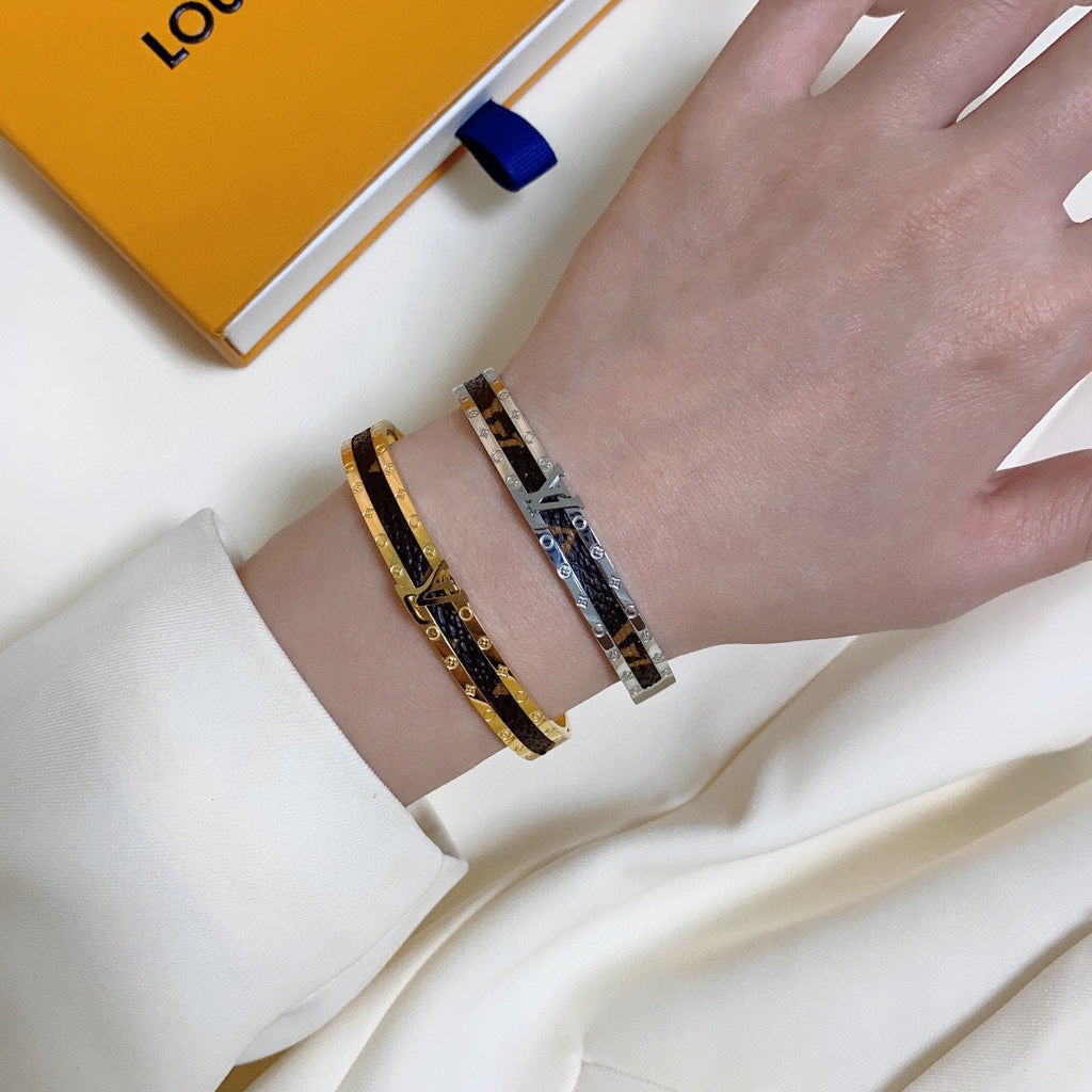 Louis Vuitton Leather Vintage 18K Gold Bracelet