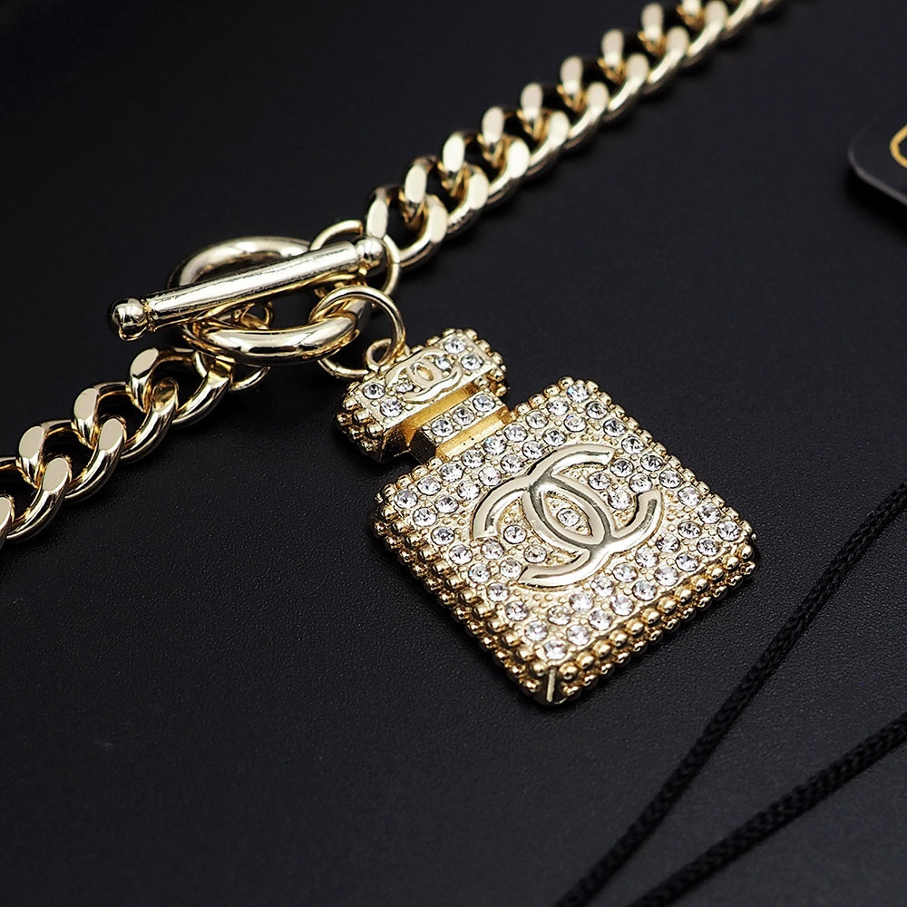 Chanel Diamond Perfume Bottle Pendant 18K Gold Necklace