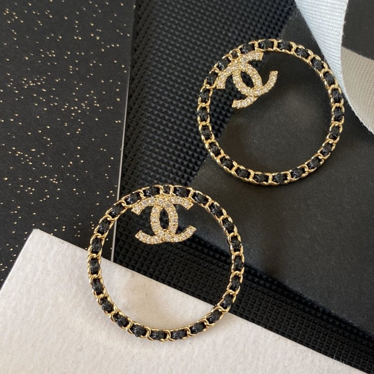 Chanel Black Leather Circle 18K Gold Earrings