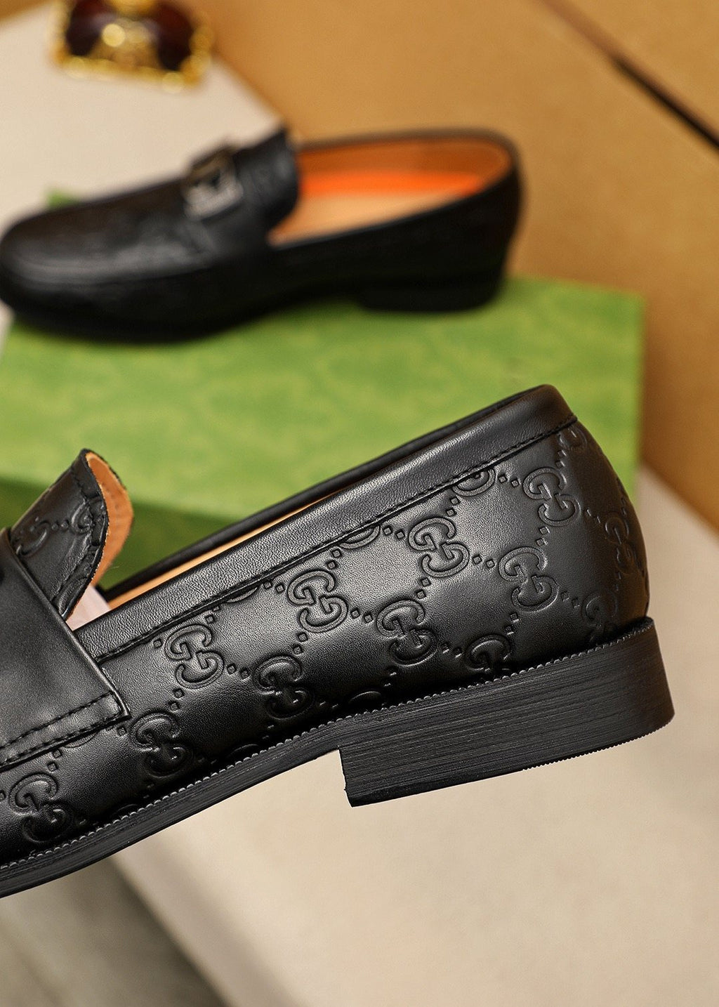 GUCCI Black Embossed Leather Loafers — detail