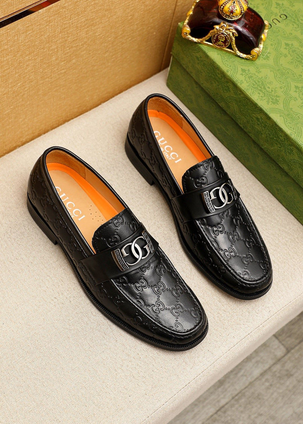 GUCCI Black Embossed Leather Loafers — hero