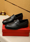 Ferragamo Black Textured Loafers — hero