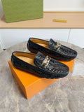 Black Embossed Buckle Loafers — hero