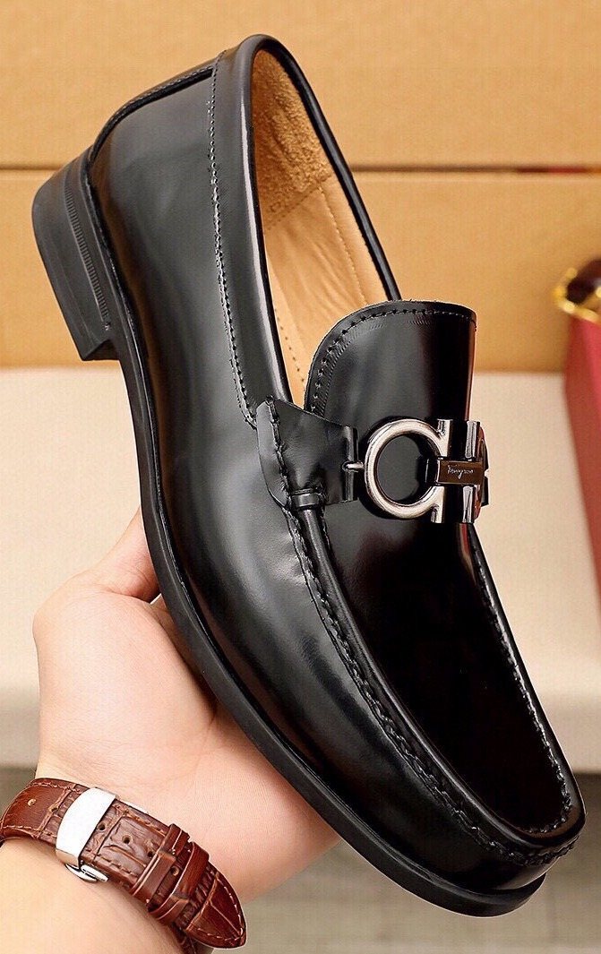 Ferragamo Black Hardware Loafers — hero