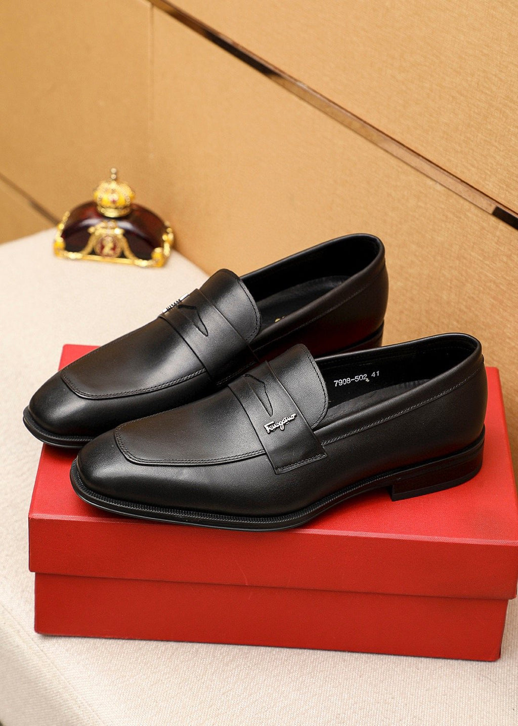 Ferragamo Black Metal Accent Loafers — front