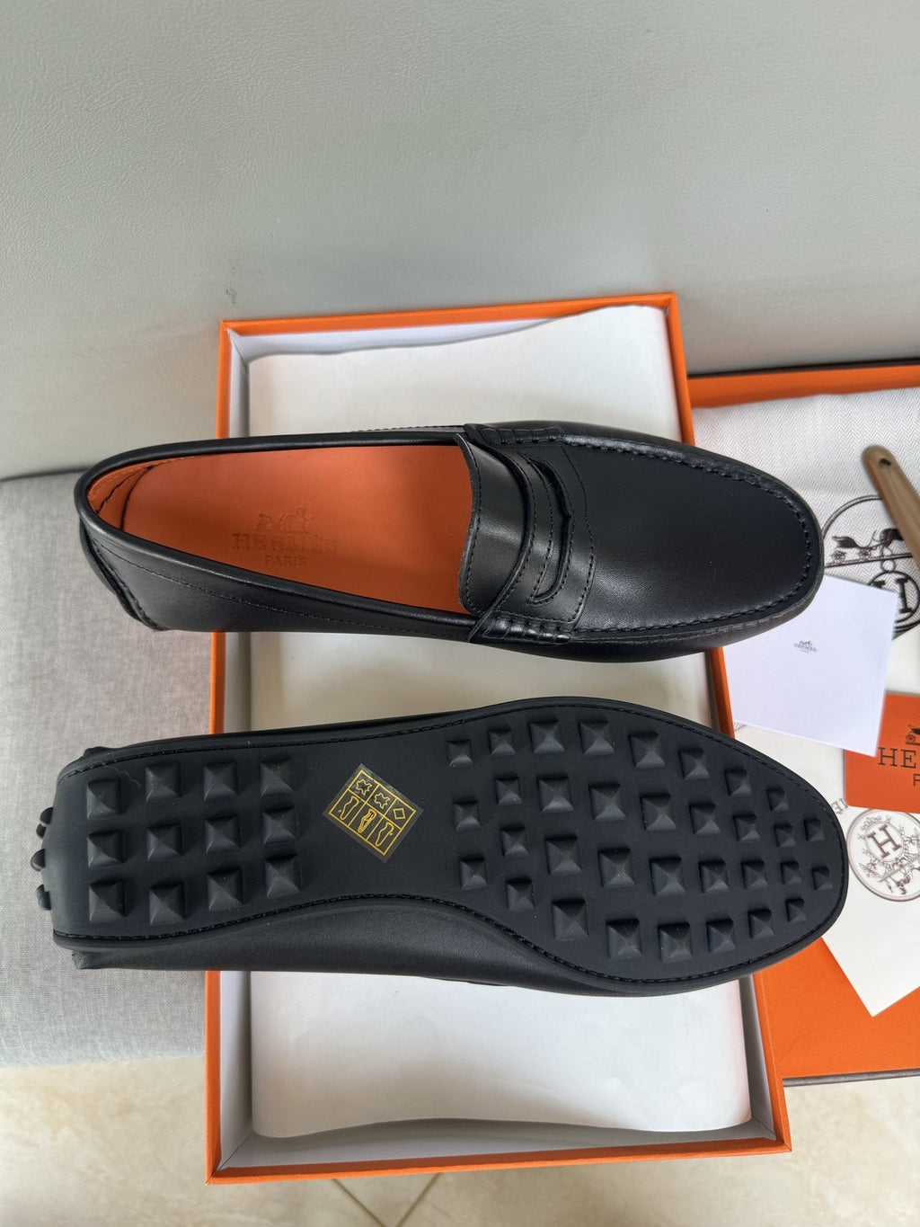 Hermès Black Slip-On Loafers — side