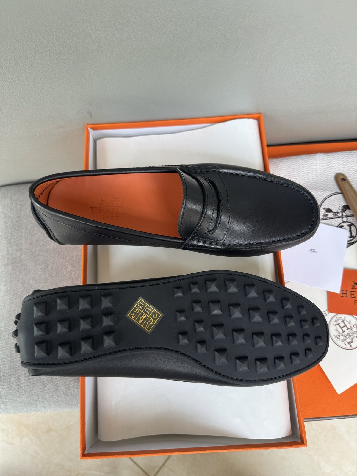 Hermès Black Slip-On Loafers — side