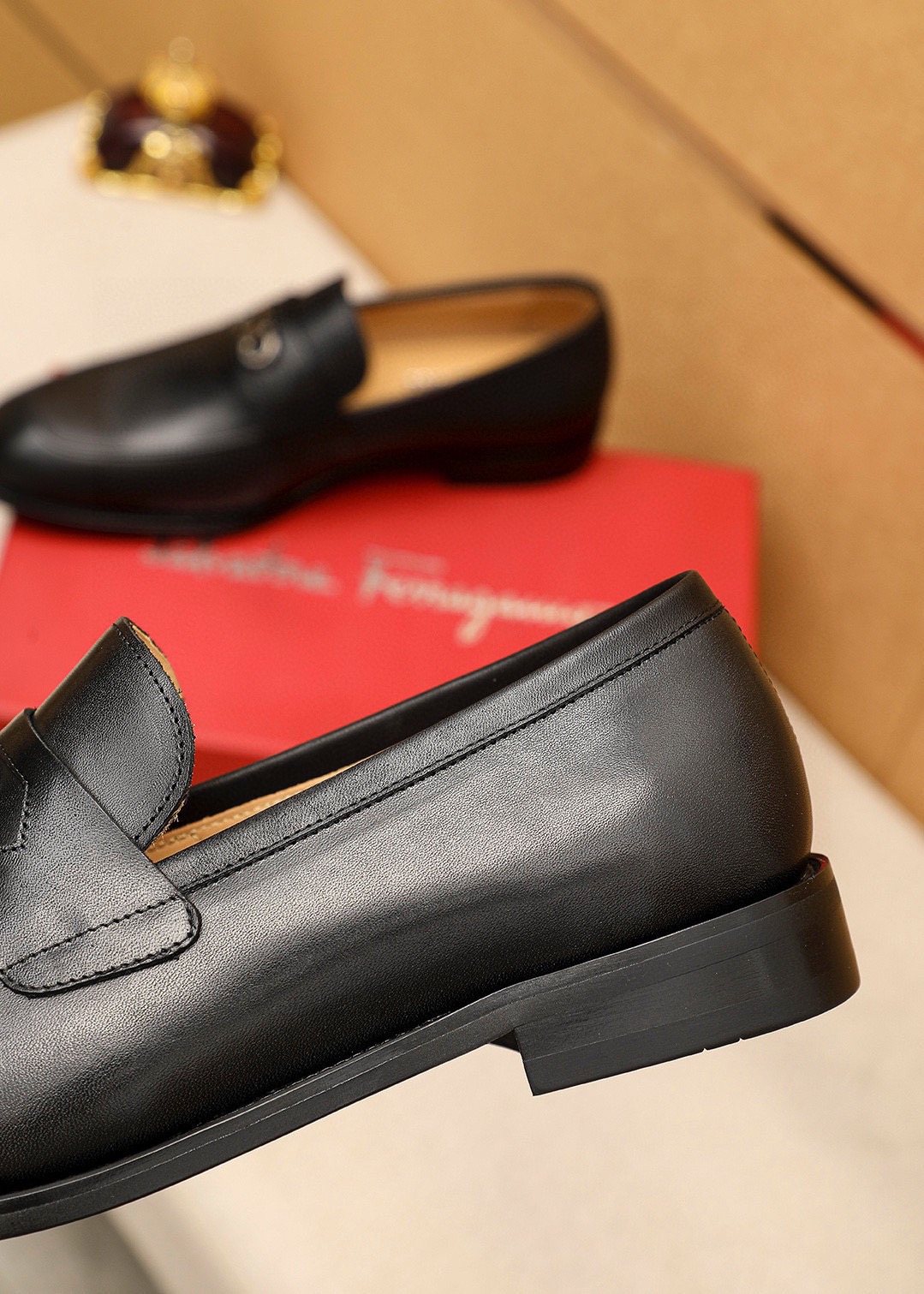 Ferragamo Black Metal Hardware Loafers — detail